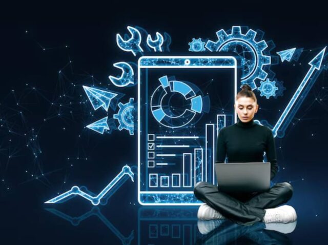 thoughtful-young-woman-with-laptop-creative-polygonal-interface-with-cogs-business-chart-blue-background-project-management-maintenance-tool-online-finance-system-concept_670147-88963